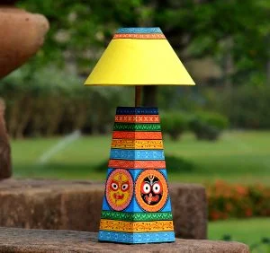 Wooden tini thakura motif table lamp