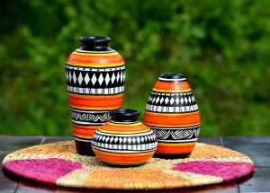 Terracotta trio orange vases