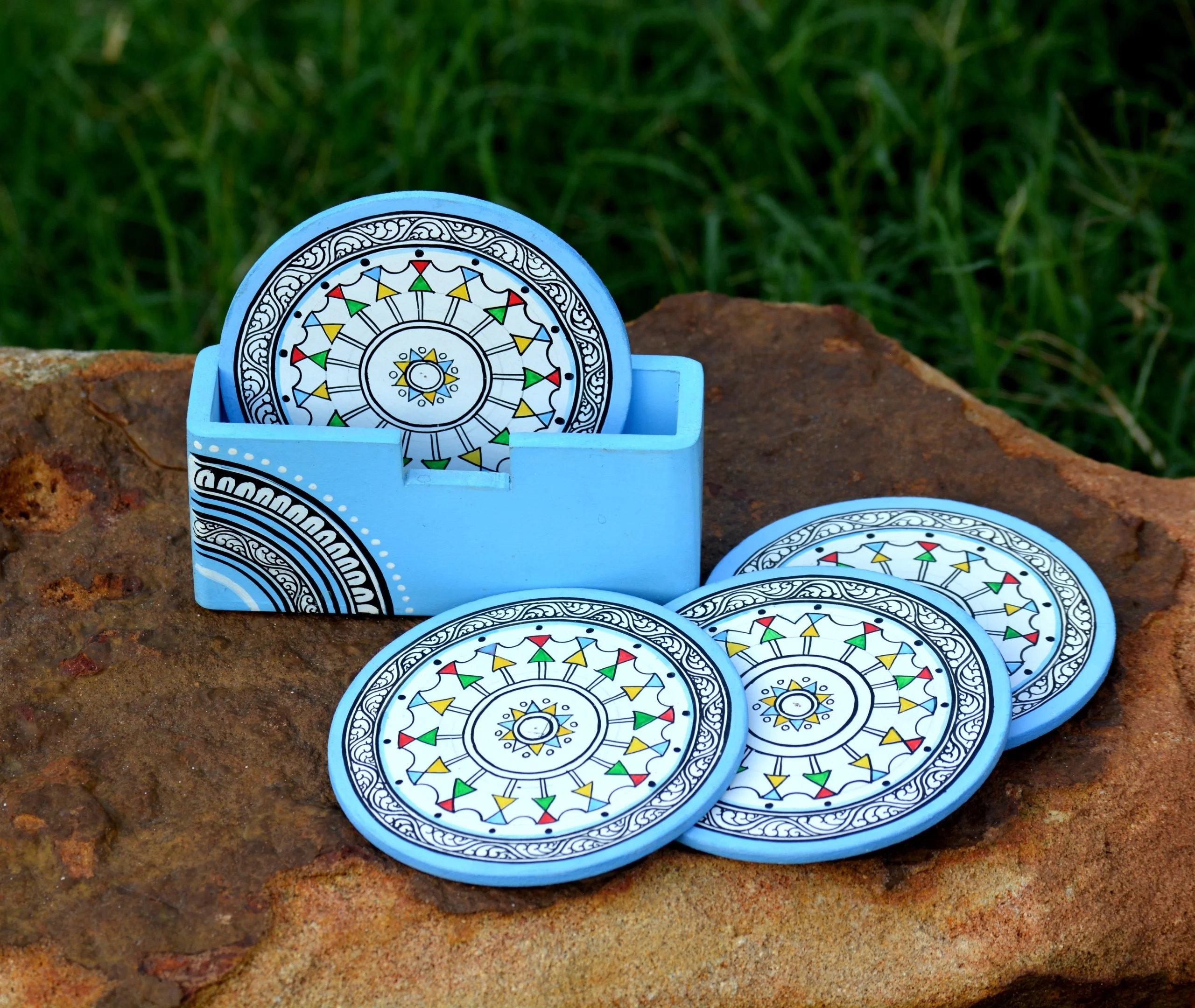 Hand painted tribal motif round coasters